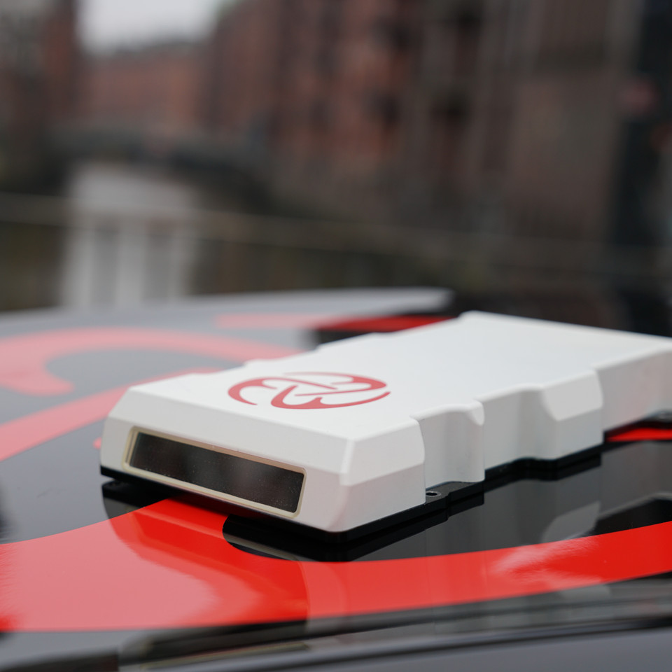 MicroVision MAVIN on top of a car roof.